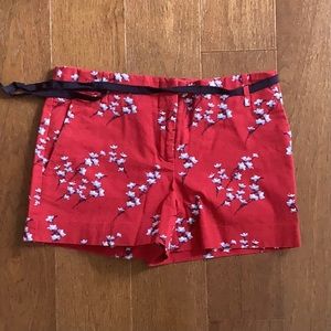 Red & blue floral shorts, sturdy textured material with decorative black ribbon